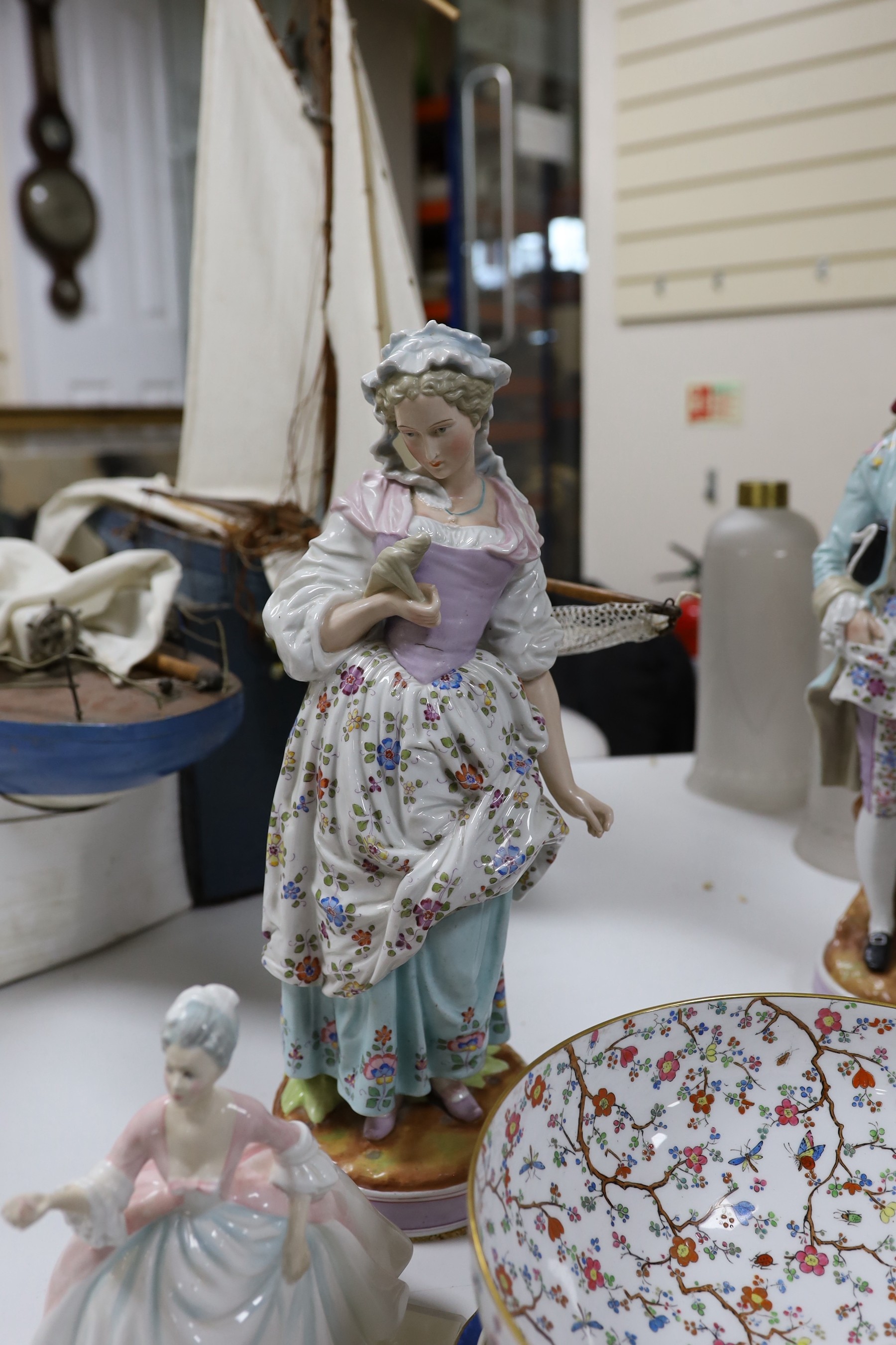 A pair of continental figurines, a Lladro figurine, Royal Doulton 'Diana' figurine, Spode bowl and two plates. Tallest 44cm